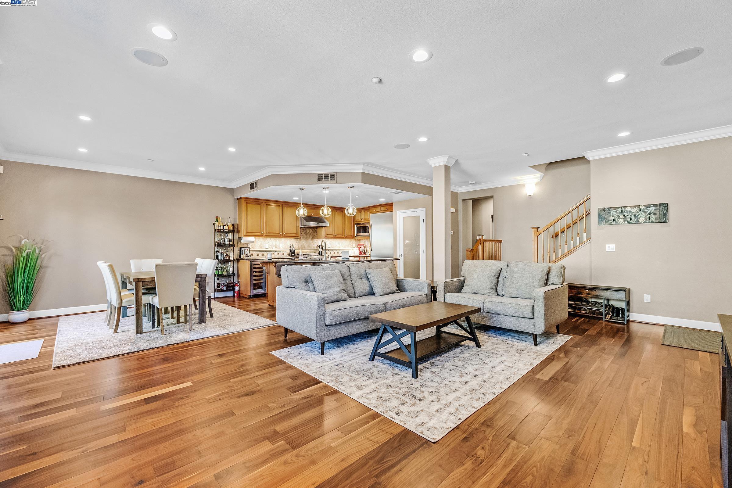 588 Dovecote Lane, Unit 4 Livermore, CA 94551 - Photo 2 of 21 a living room with furniture and a wooden floor