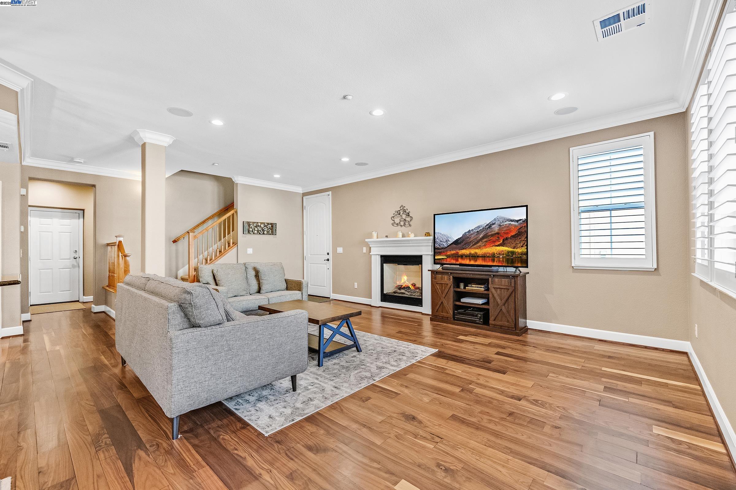 588 Dovecote Lane, Unit 4 Livermore, CA 94551 - Photo 8 of 21 a living room with furniture and a fireplace