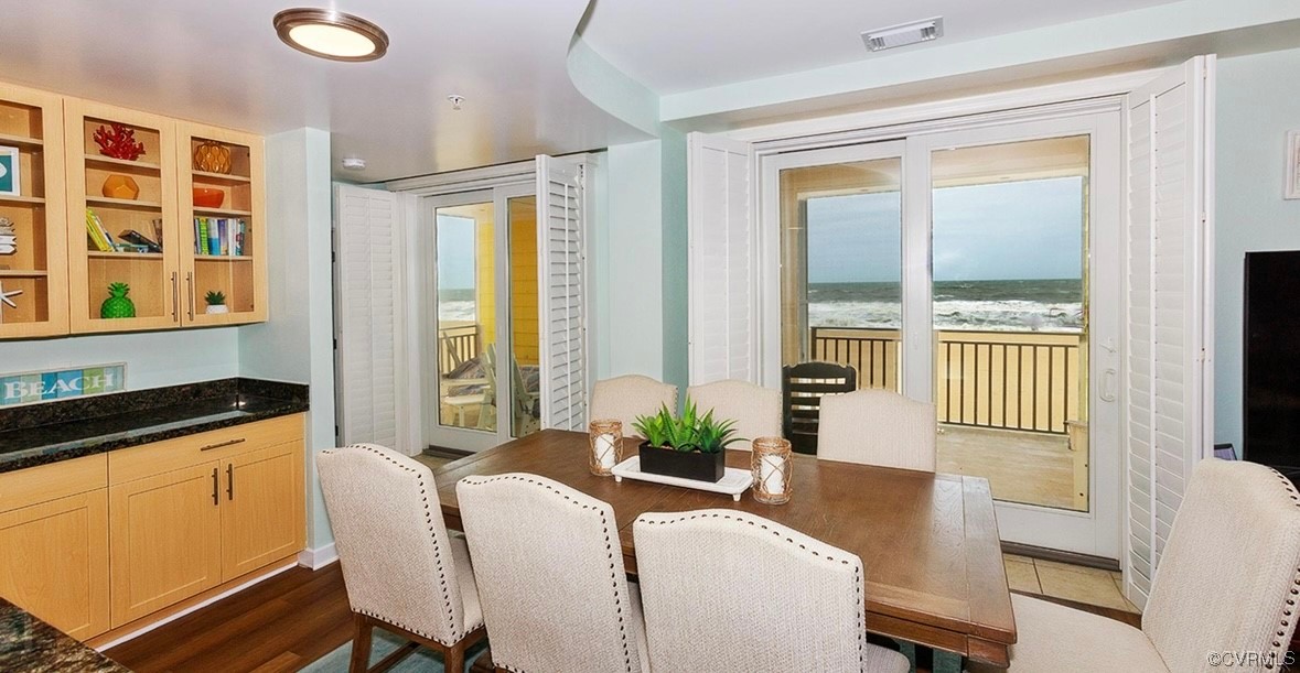3738 Sandpiper Road, Unit 108B Virginia Beach, VA 23456 - Photo 13 of 31 a living room with furniture and a window