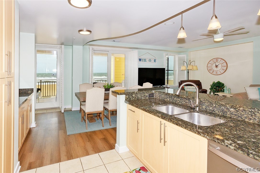 3738 Sandpiper Road, Unit 108B Virginia Beach, VA 23456 - Photo 15 of 31 a kitchen with a sink and a stove top oven