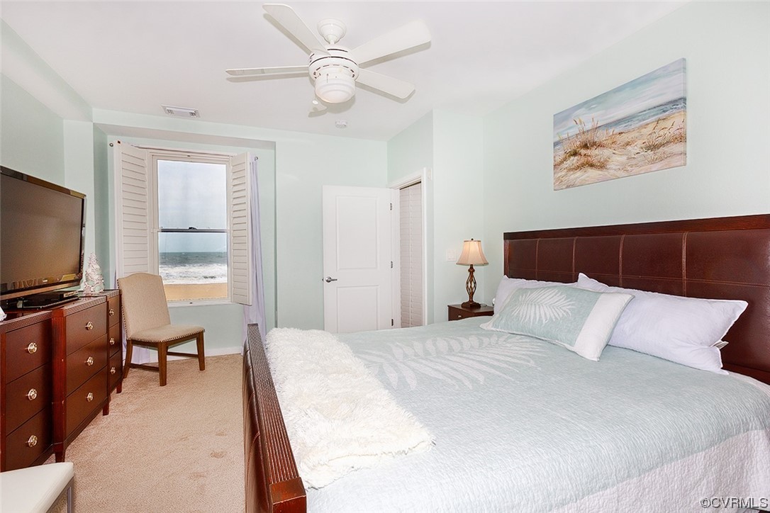 3738 Sandpiper Road, Unit 108B Virginia Beach, VA 23456 - Photo 18 of 31 a bedroom with a large bed and furniture