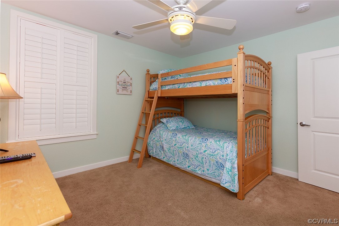 3738 Sandpiper Road, Unit 108B Virginia Beach, VA 23456 - Photo 19 of 31 a bedroom with a bed and a window