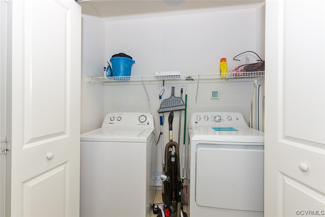 3738 Sandpiper Road, Unit 108B Virginia Beach, VA 23456 - Photo 24 of 31 a utility room with dryer and washer
