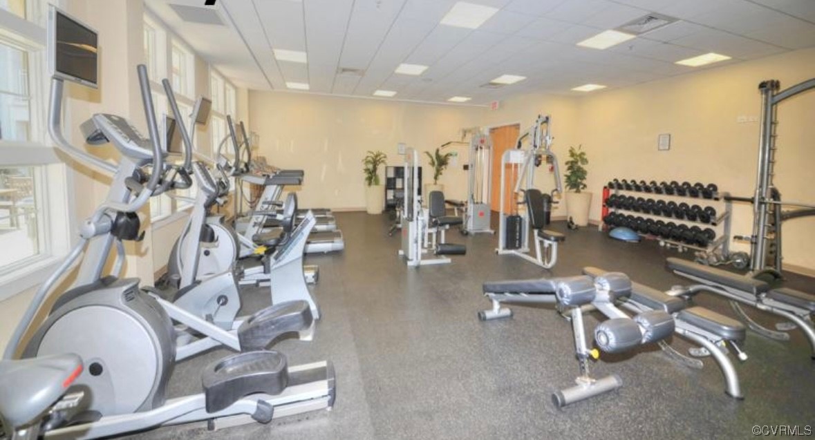 3738 Sandpiper Road, Unit 108B Virginia Beach, VA 23456 - Photo 31 of 31 a gym room with lots of gym equipment