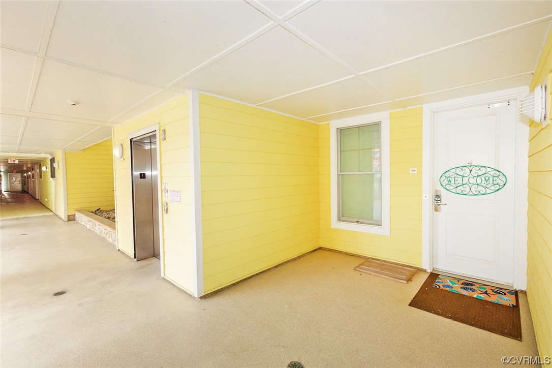 3738 Sandpiper Road, Unit 108B Virginia Beach, VA 23456 - Photo 5 of 31 a view of an empty room with a window