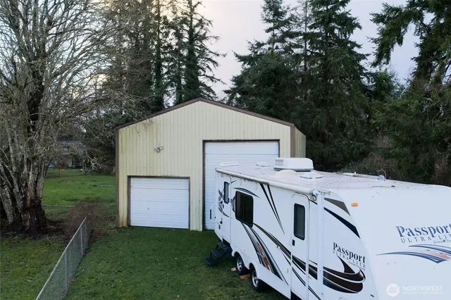 a view of a back yard of the house