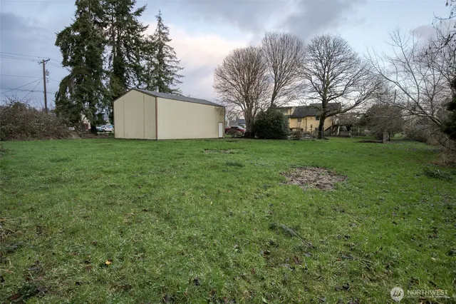 a backyard of a house with lots of green space