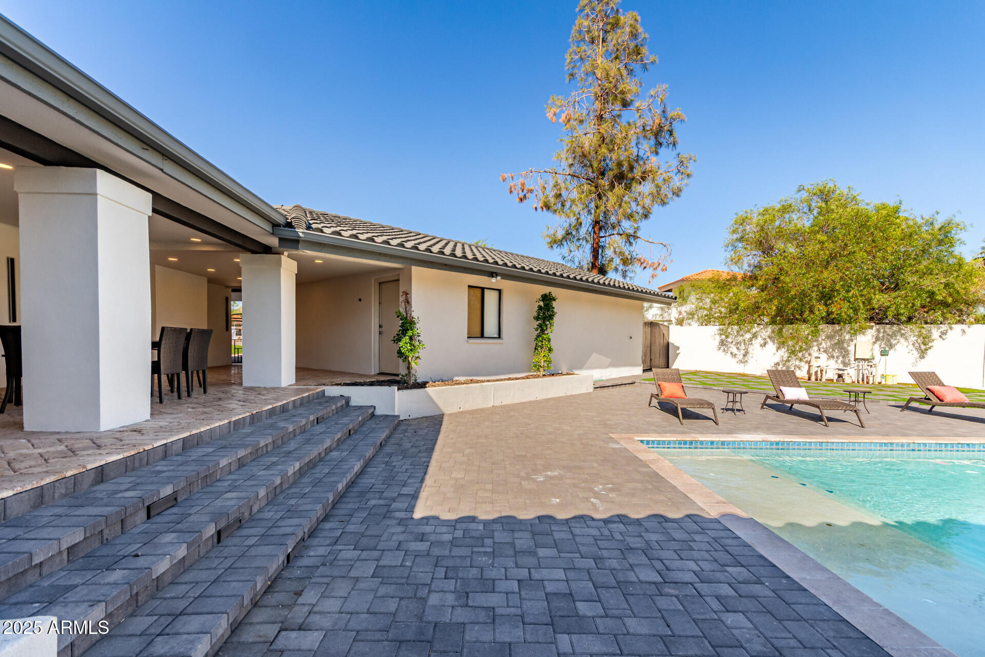 3301 East Rovey Avenue Paradise Valley, AZ 85253 - Photo 105 of 105 a front view of a house with a yard and garage