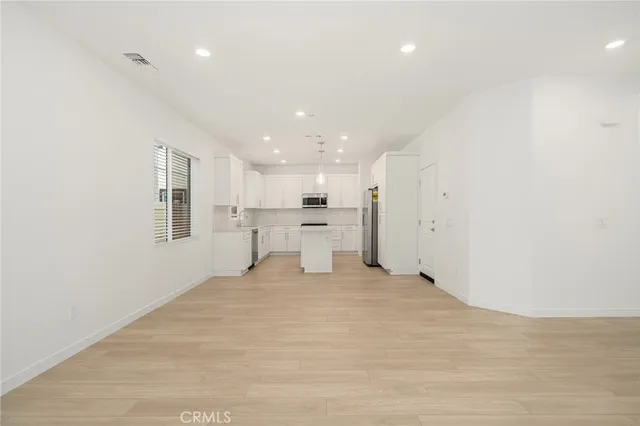 a view of a kitchen with a sink