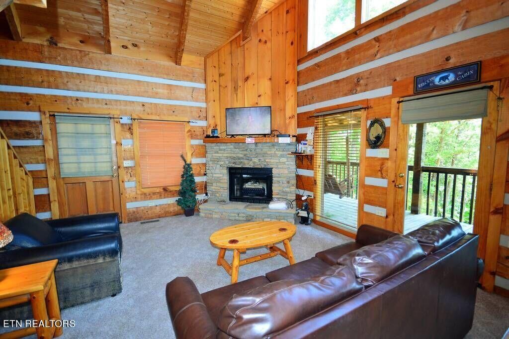 2165 Rising Fawn Way Sevierville, TN 37862 - Photo 9 of 24 a living room with furniture fireplace and flat screen tv