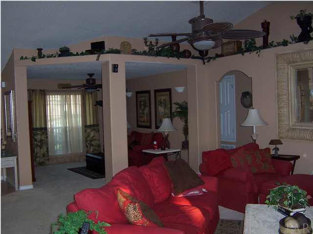 LIVING ROOM LOOKING INTO SITTING AREA
