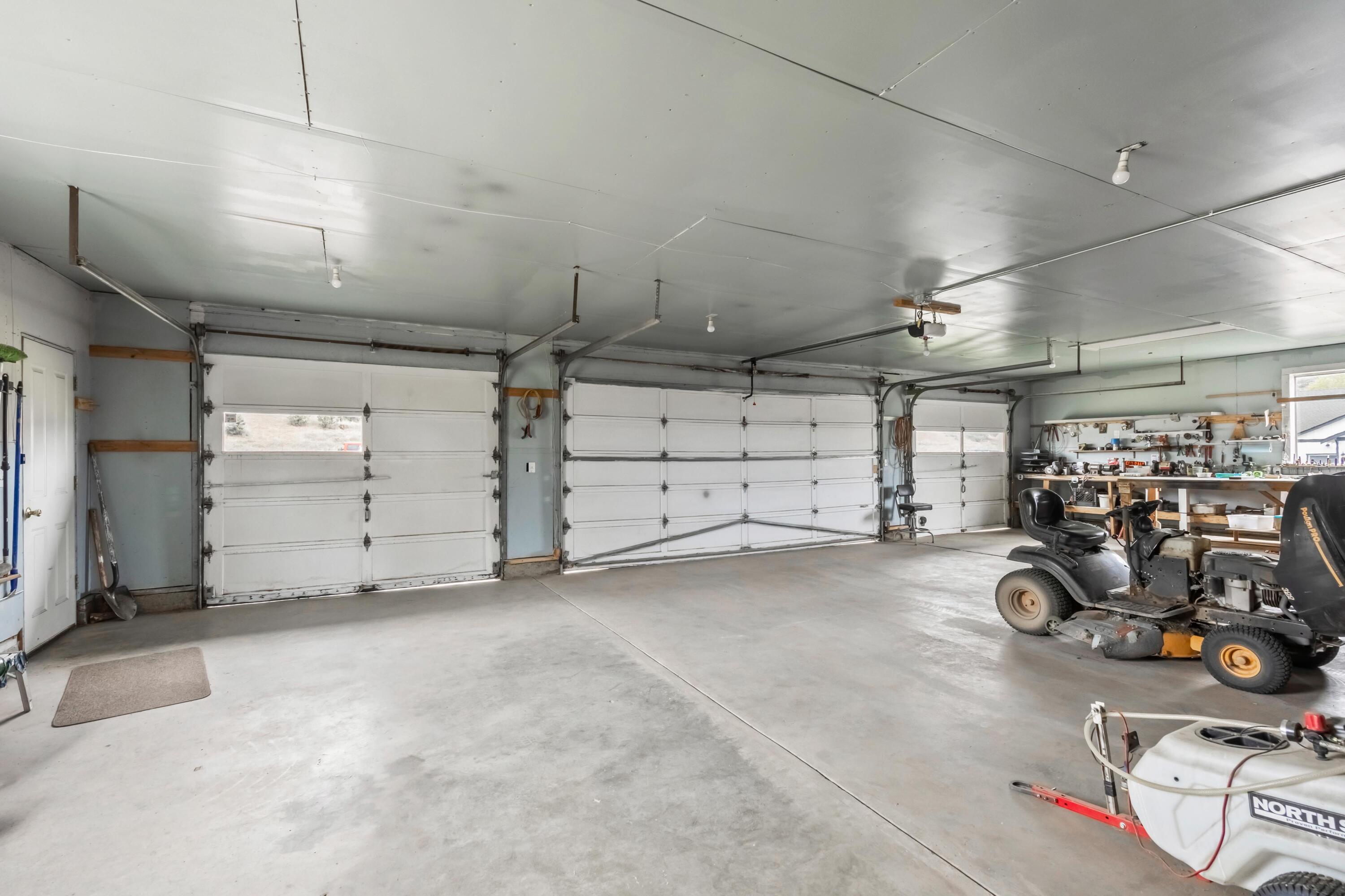 2010 Northeast Laughlin Road Prineville, OR 97754 - Photo 28 of 39 a view of a garage with storage