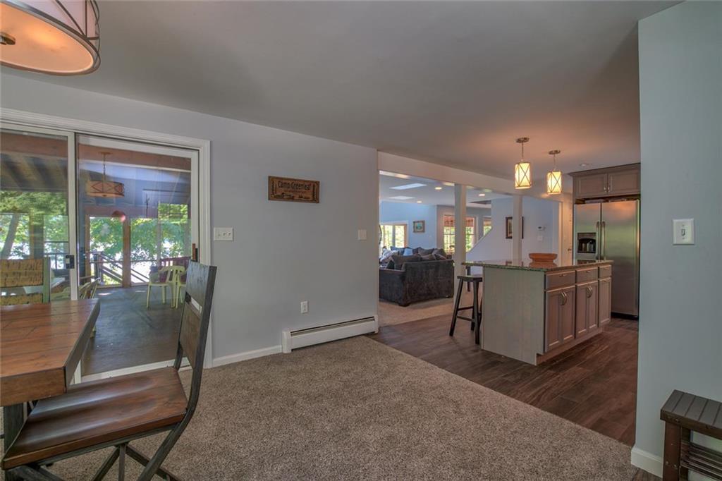100 Kal Shore Road Norway, ME 04268 - Photo 4 of 35 Dining and kitchen looking into...
