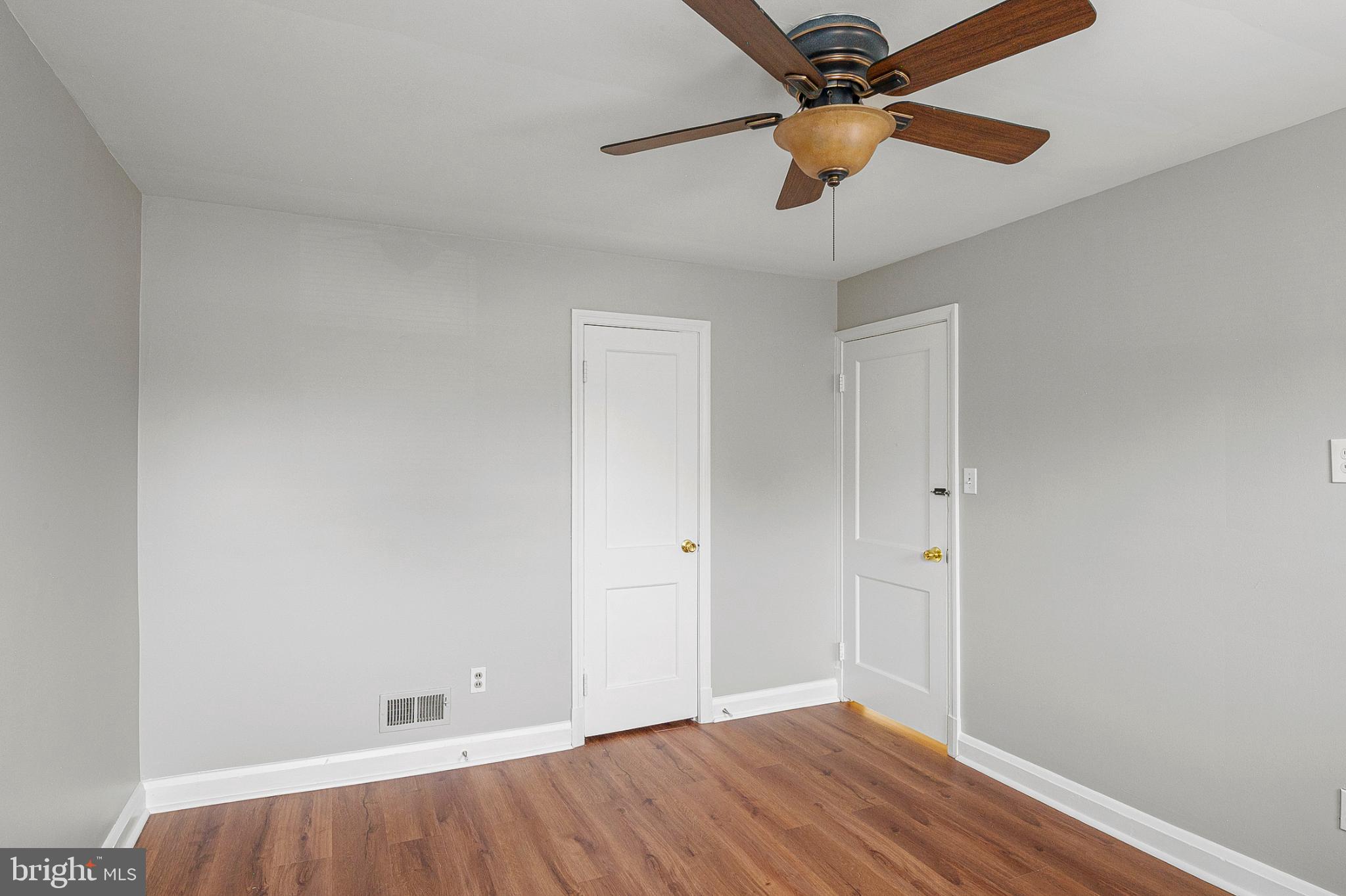1621 Thetford Road Towson, MD 21286 - Photo 15 of 31 a view of room with hardwood floor and a ceiling fan