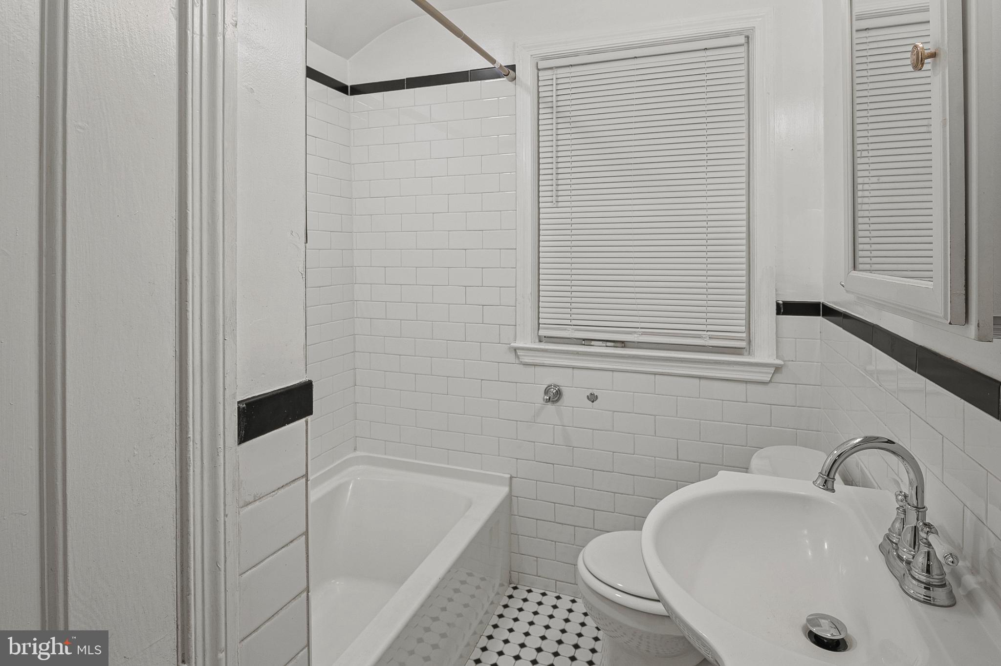 1621 Thetford Road Towson, MD 21286 - Photo 18 of 31 a bathroom with a sink a toilet and shower