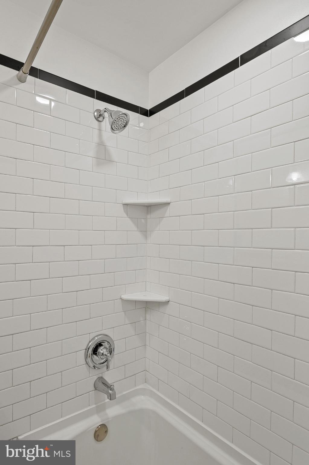 1621 Thetford Road Towson, MD 21286 - Photo 19 of 31 a bathroom with a shower and a bath tub