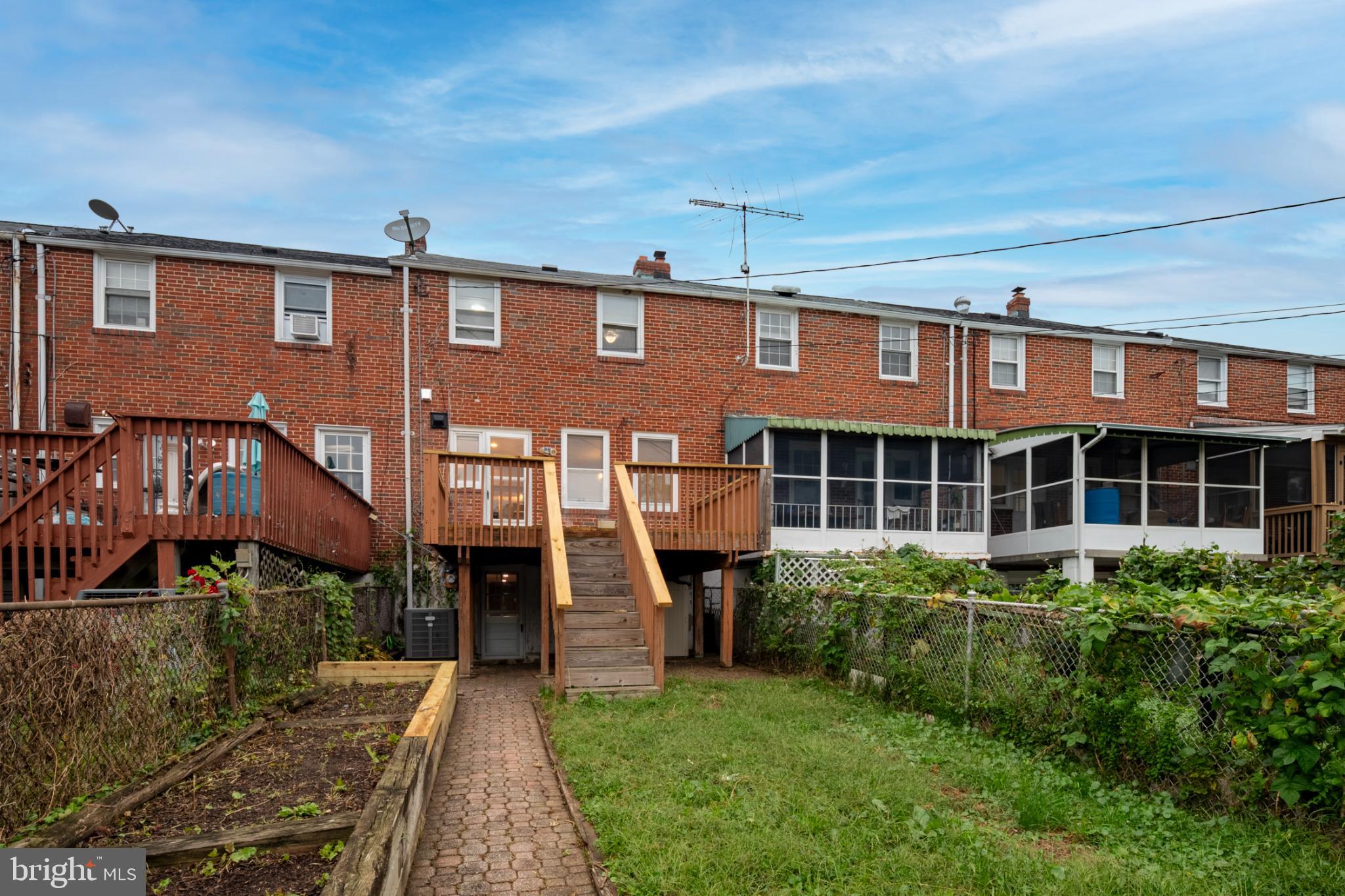 1621 Thetford Road Towson, MD 21286 - Photo 29 of 31 a front view of a house with a yard