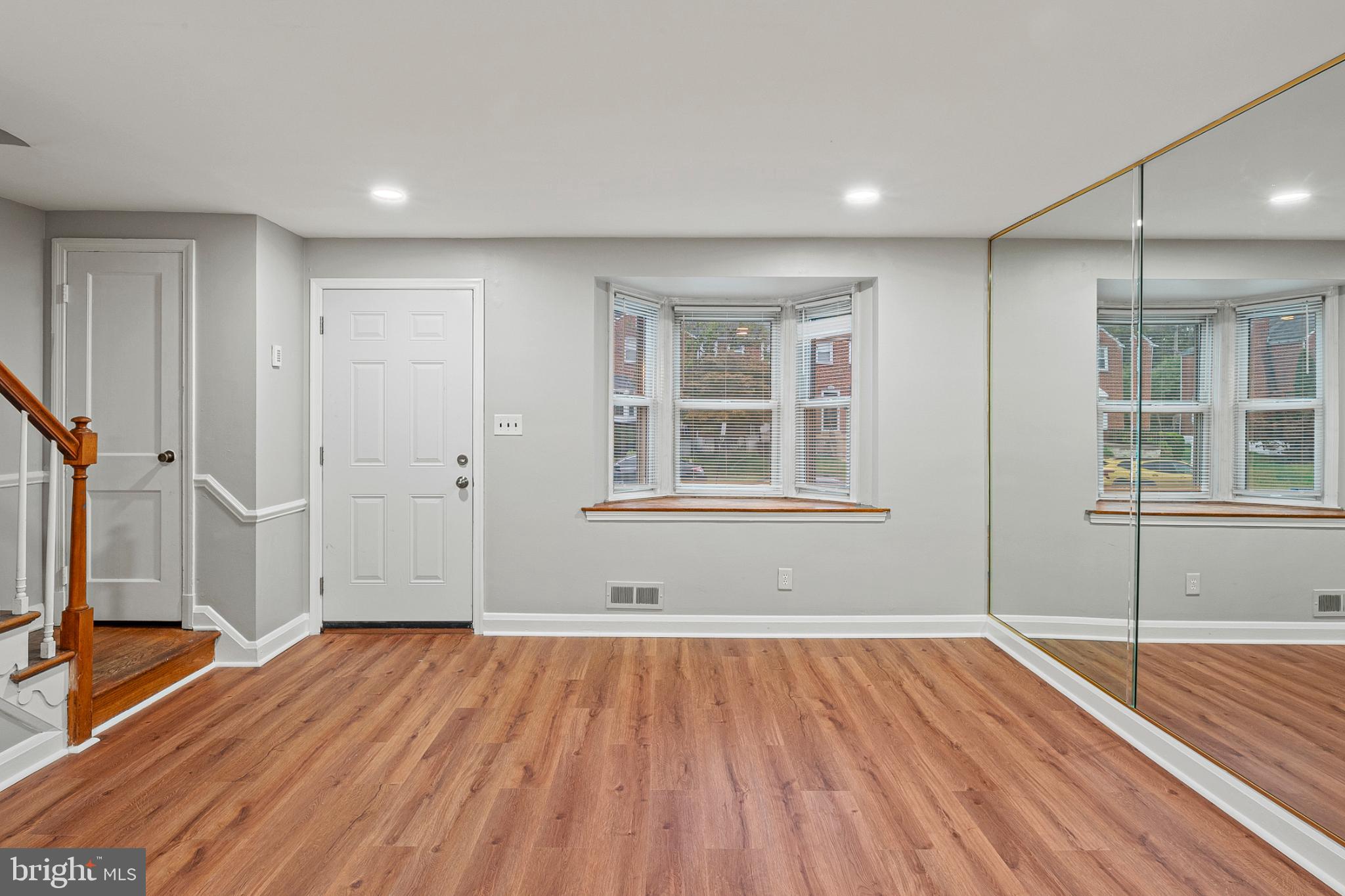 1621 Thetford Road Towson, MD 21286 - Photo 5 of 31 a view of empty room with wooden floor and fan