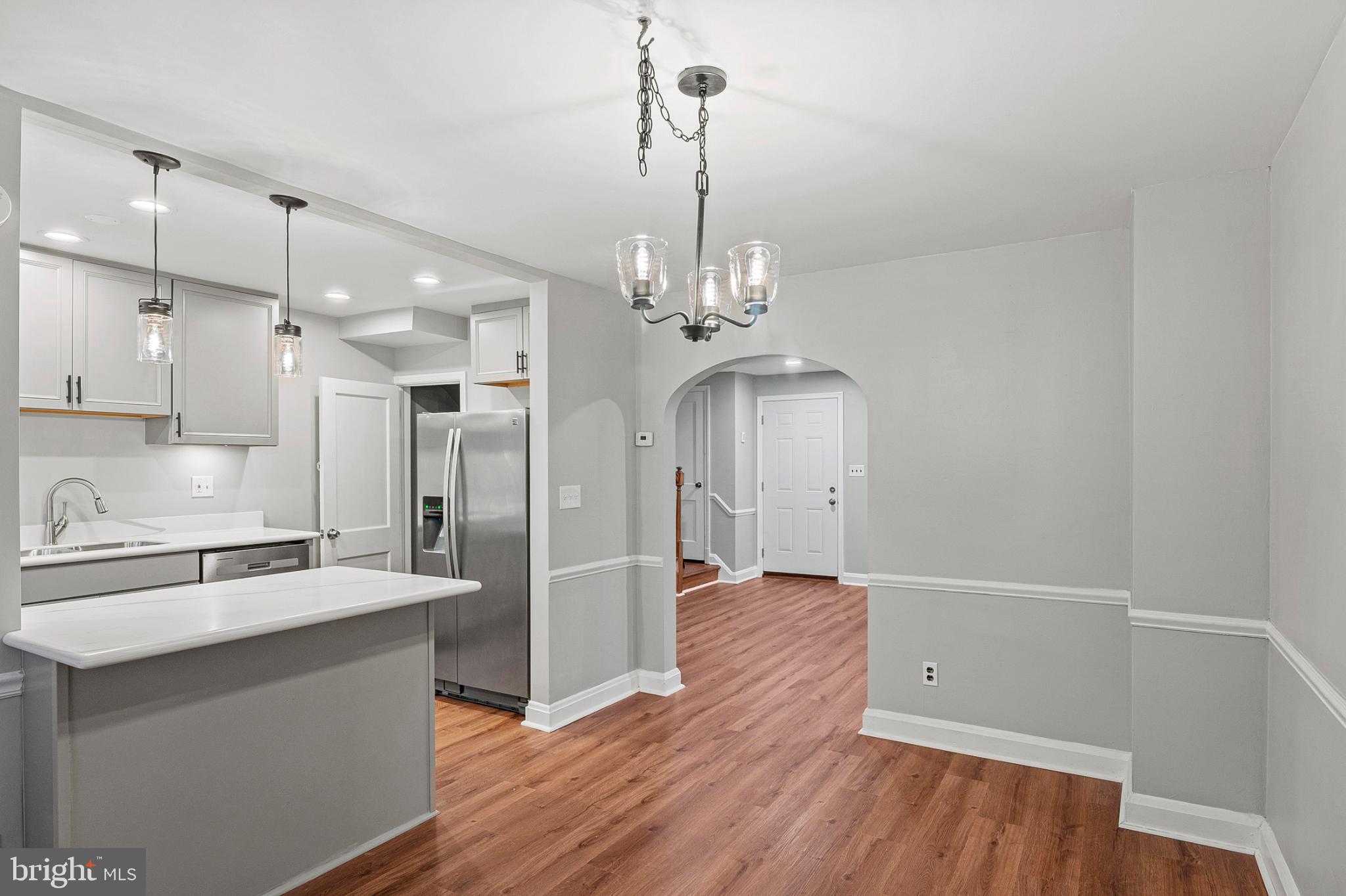 1621 Thetford Road Towson, MD 21286 - Photo 9 of 31 a view of a kitchen with a sink and wooden floor