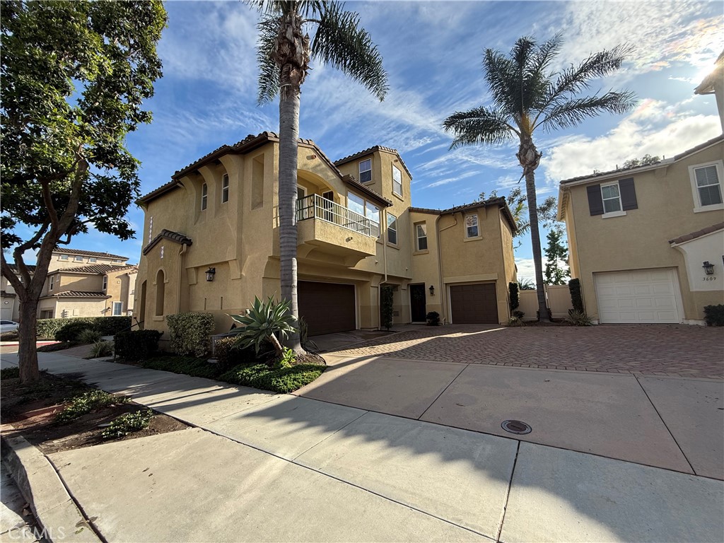 3603 Jetty Carlsbad, CA 92010 - Photo 2 of 43 a front view of a house with a yard