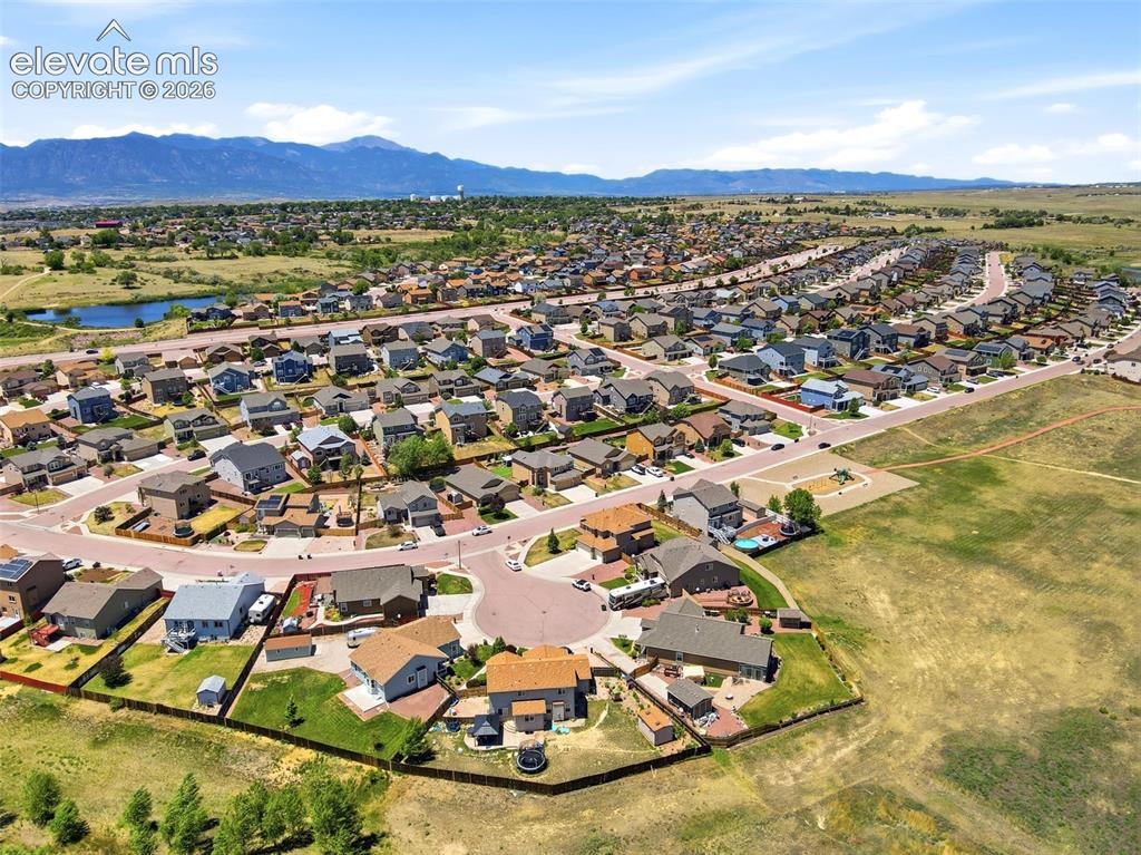 7806 Dutch Loop Colorado Springs, CO 80925 - Photo 36 of 41 an aerial view of residential houses with outdoor space