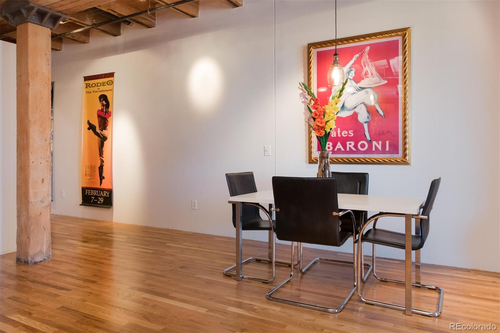 1801 Wynkoop Street, Unit 418 Denver, CO 80202 - Photo 11 of 35 a view of a room with furniture and wooden floor