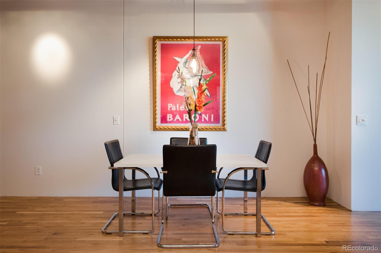 1801 Wynkoop Street, Unit 418 Denver, CO 80202 - Photo 12 of 35 a view of a workspace with furniture and wooden floor