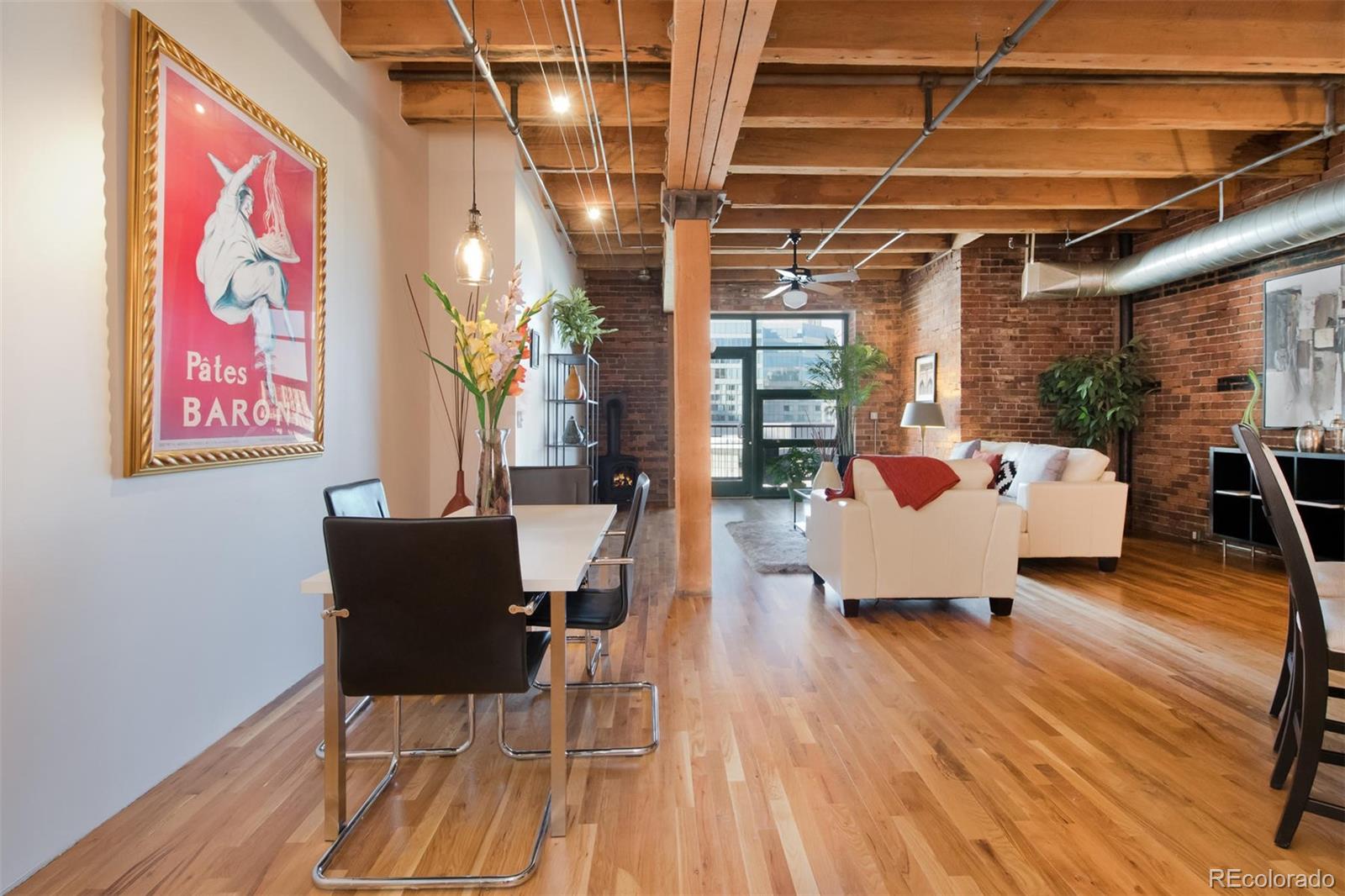 1801 Wynkoop Street, Unit 418 Denver, CO 80202 - Photo 13 of 35 a living room with patio