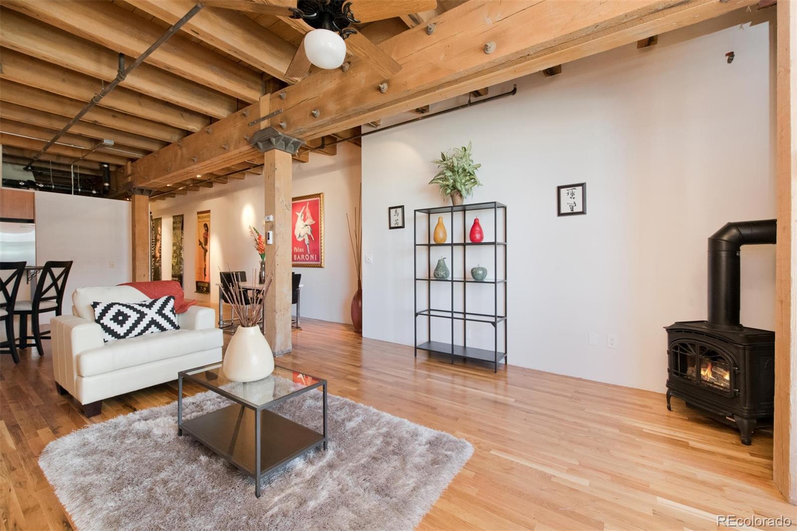 1801 Wynkoop Street, Unit 418 Denver, CO 80202 - Photo 21 of 35 a living room with furniture and wooden floor