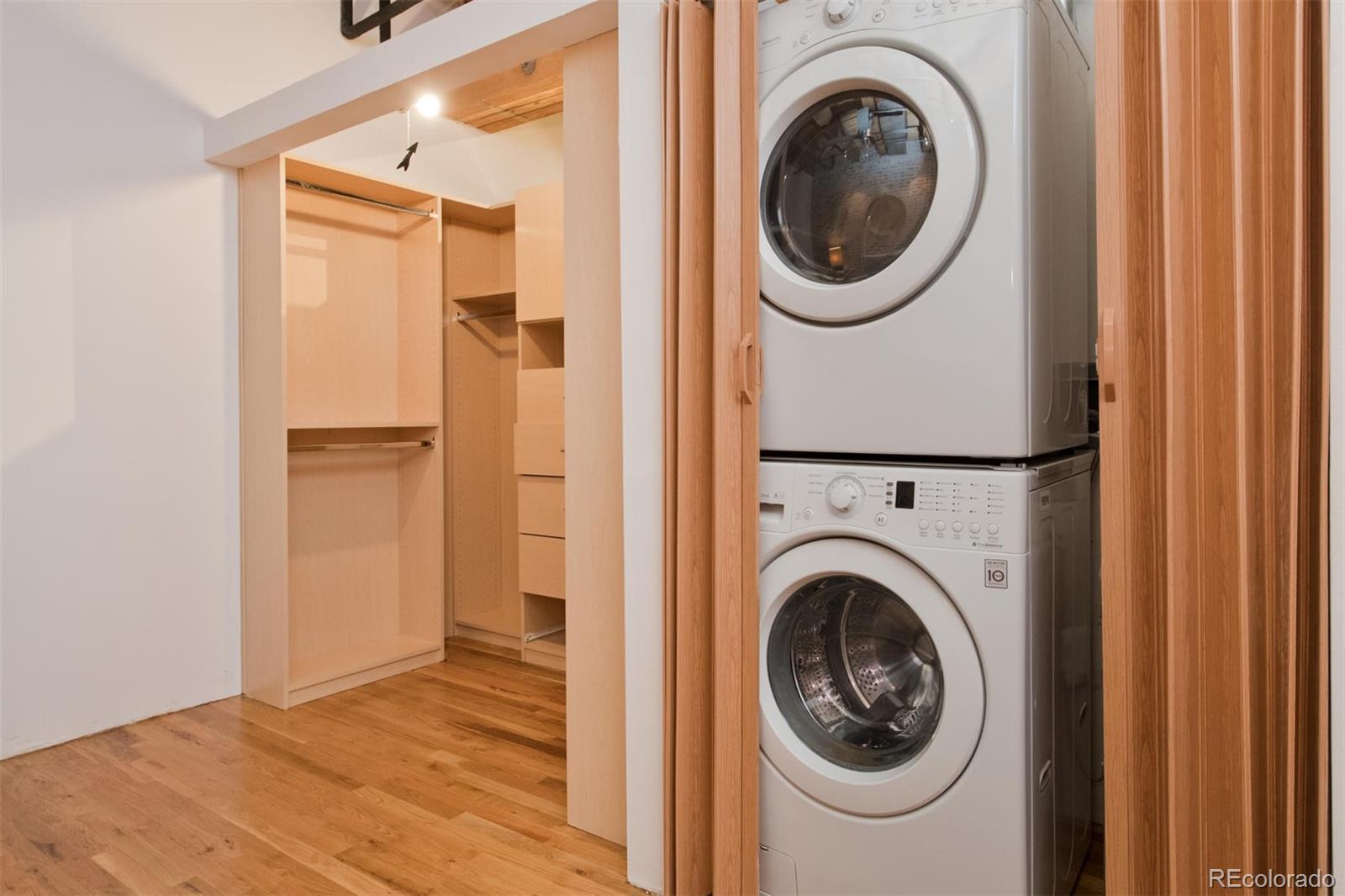 1801 Wynkoop Street, Unit 418 Denver, CO 80202 - Photo 29 of 35 a close view of a utility room with dryer and washer