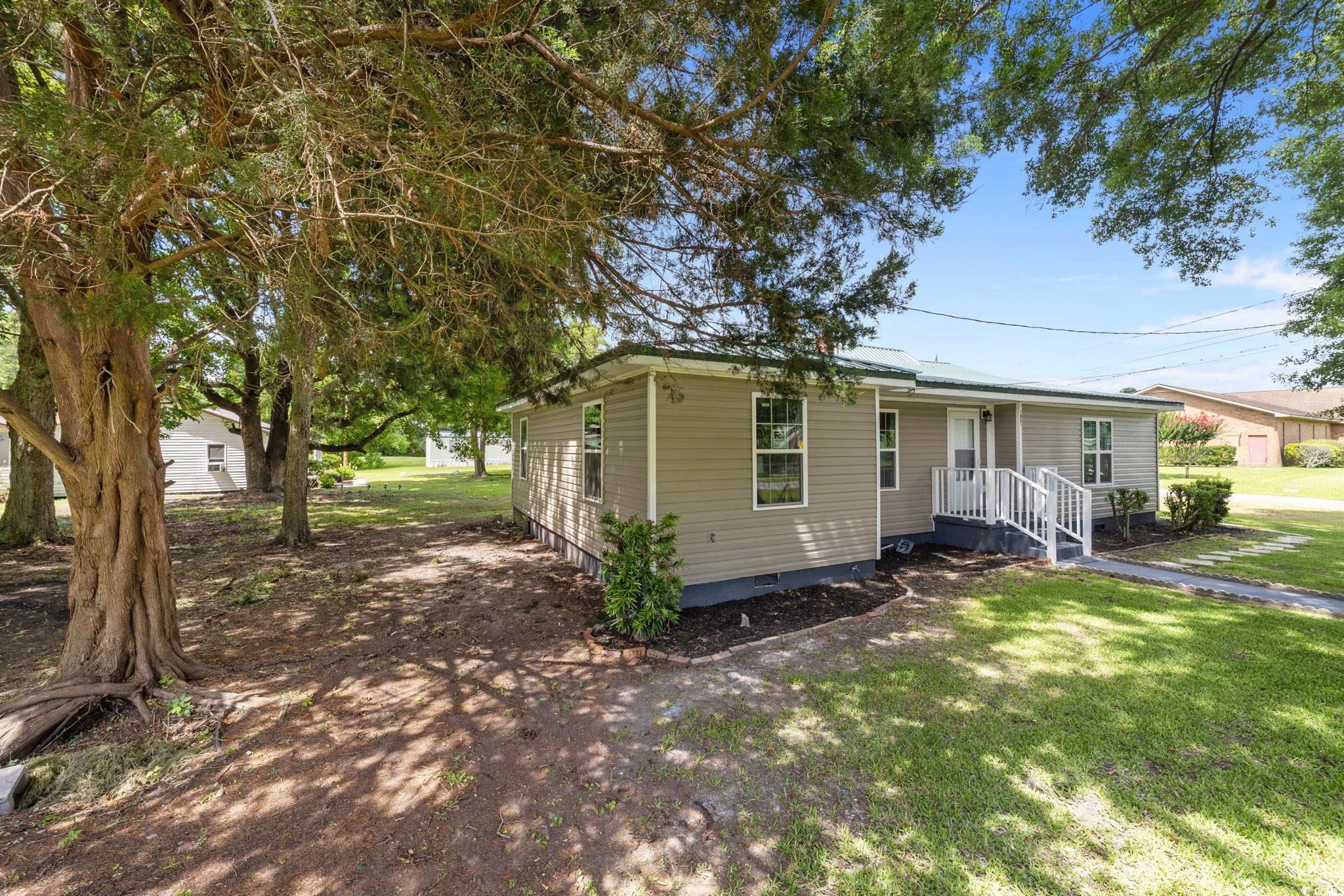 1821 Hawkins Street Georgetown, SC 29440 - Photo 8 of 40 View of front of home featuring crawl space and a front yard