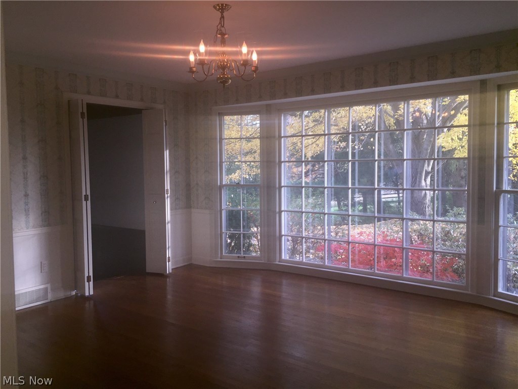 7537 Huntington Road Hudson, OH 44236 - Photo 5 of 10 The lovely dining room showcases the serenity of the landscape with a magnificent wall of windows.