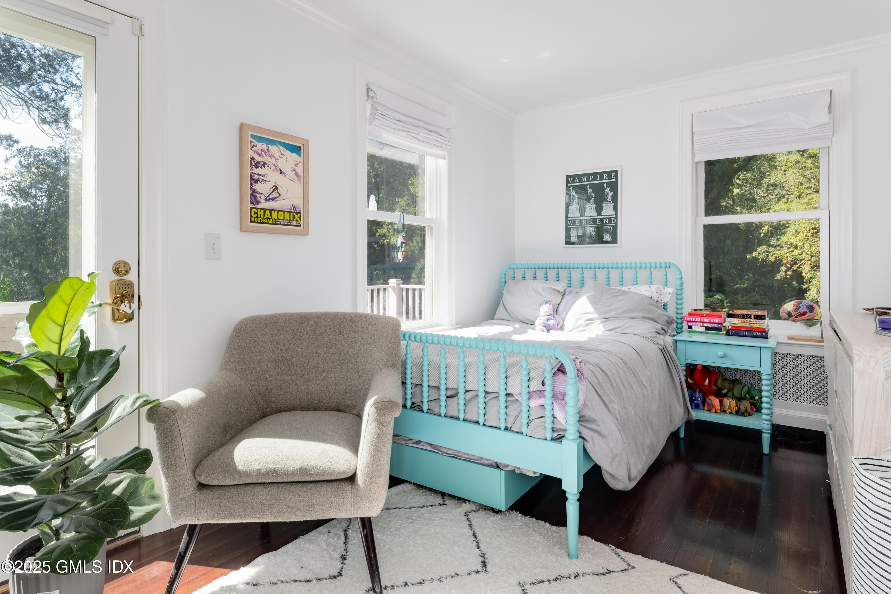 76 Sinawoy Road Cos Cob, CT 06807 - Photo 13 of 23 a bedroom with a bed table chair and a window