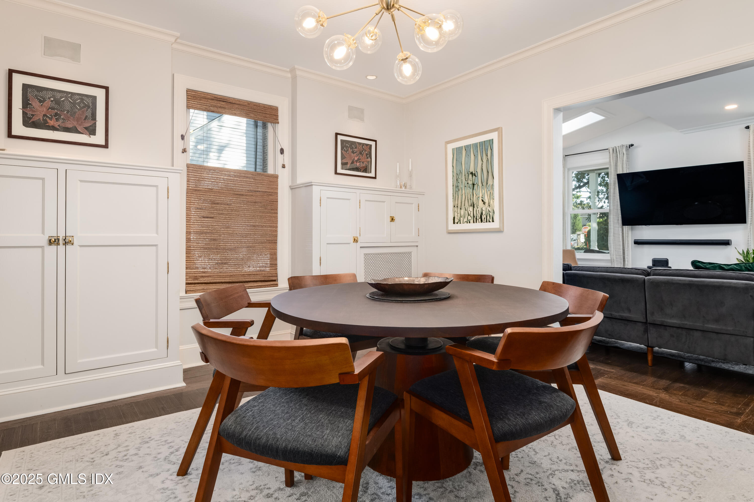 76 Sinawoy Road Cos Cob, CT 06807 - Photo 5 of 23 a view of a dining room with furniture and wooden floor