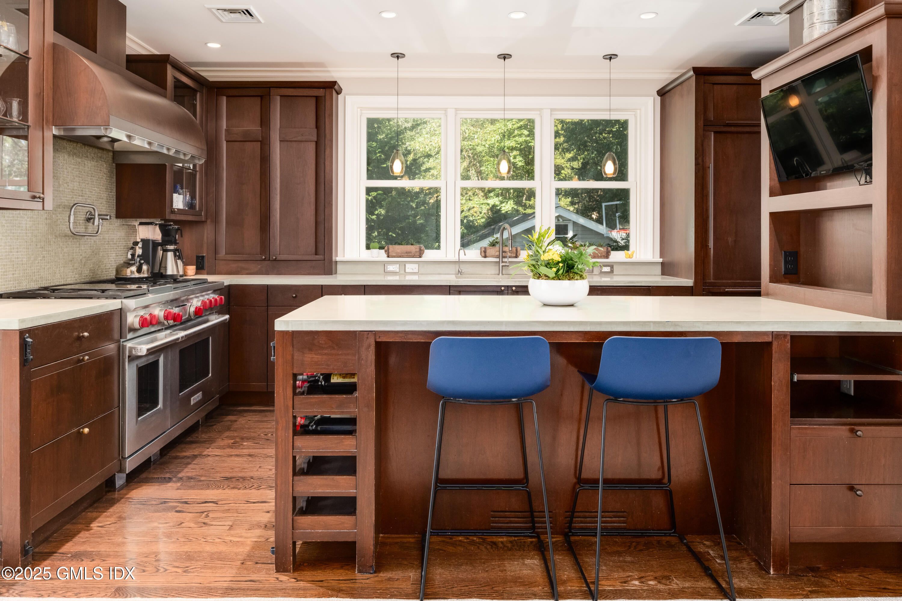 76 Sinawoy Road Cos Cob, CT 06807 - Photo 6 of 23 a kitchen with a stove a sink and a microwave