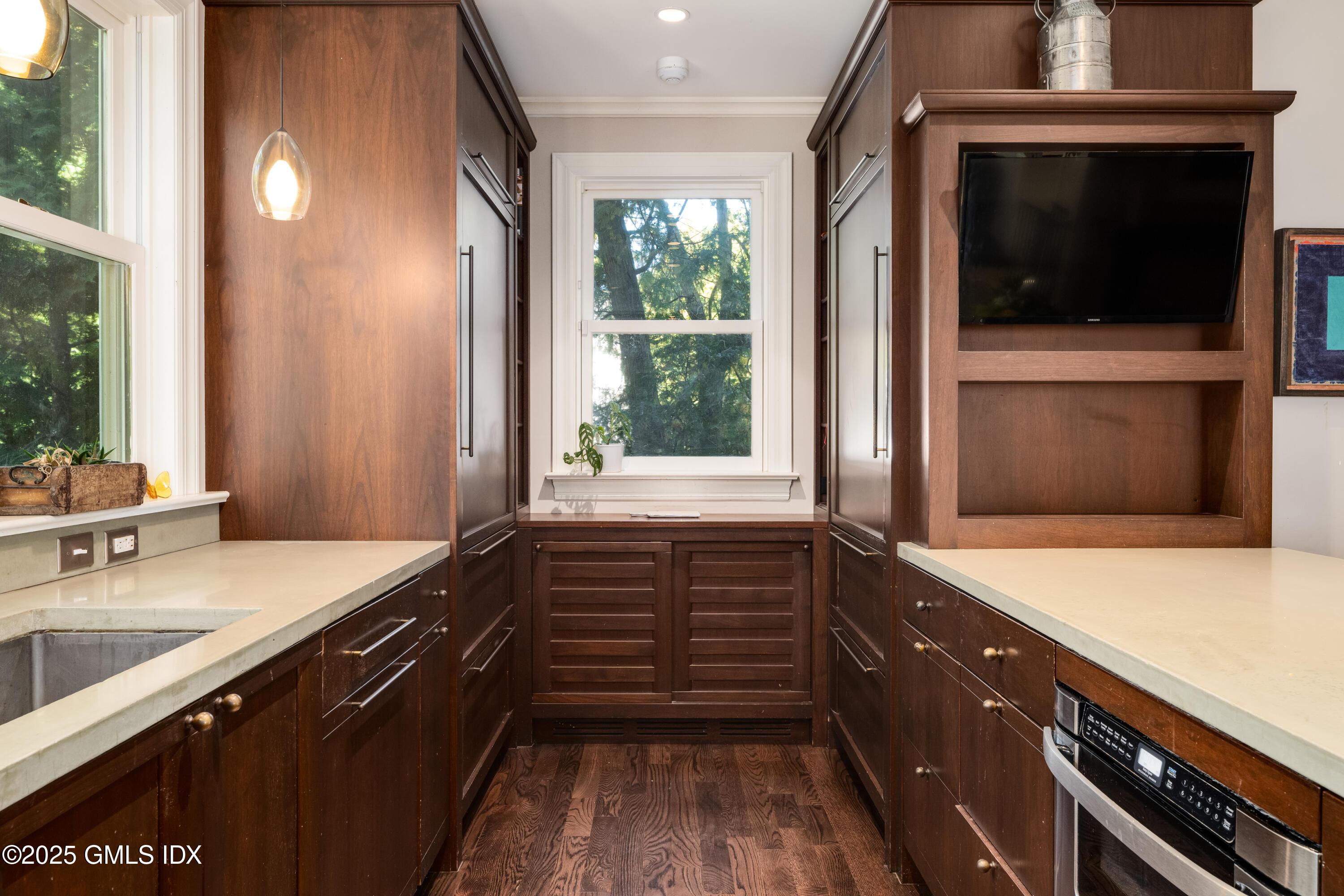 76 Sinawoy Road Cos Cob, CT 06807 - Photo 7 of 23 a kitchen with a sink and large window