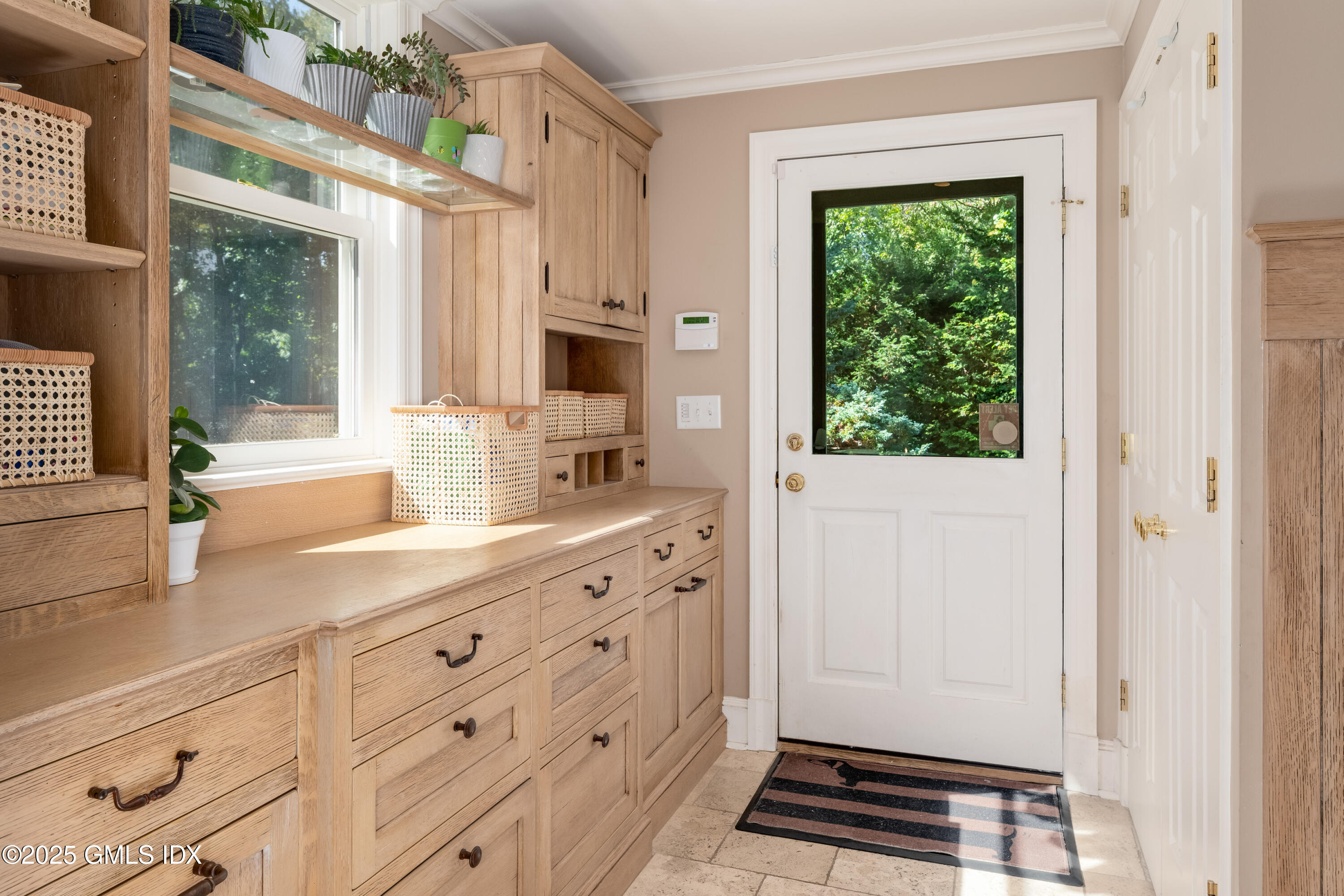 76 Sinawoy Road Cos Cob, CT 06807 - Photo 10 of 23 a bathroom with a double vanity sink a mirror and a window