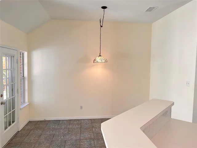 a view of a room with an empty space