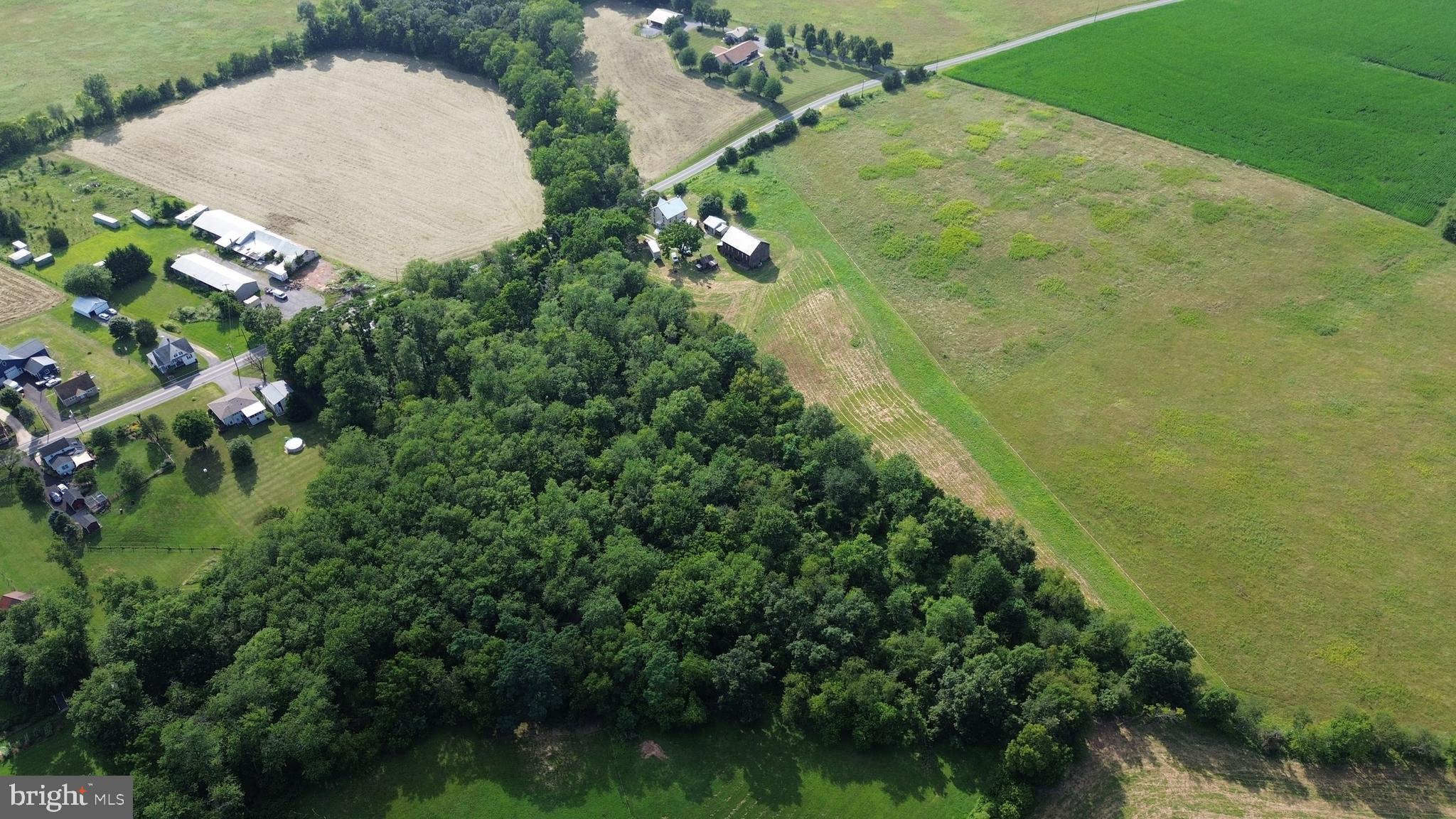 2209 Keysville Frederick Co Road Keymar, MD 21757 - Photo 124 of 150 an aerial view of a house with a yard and lake view