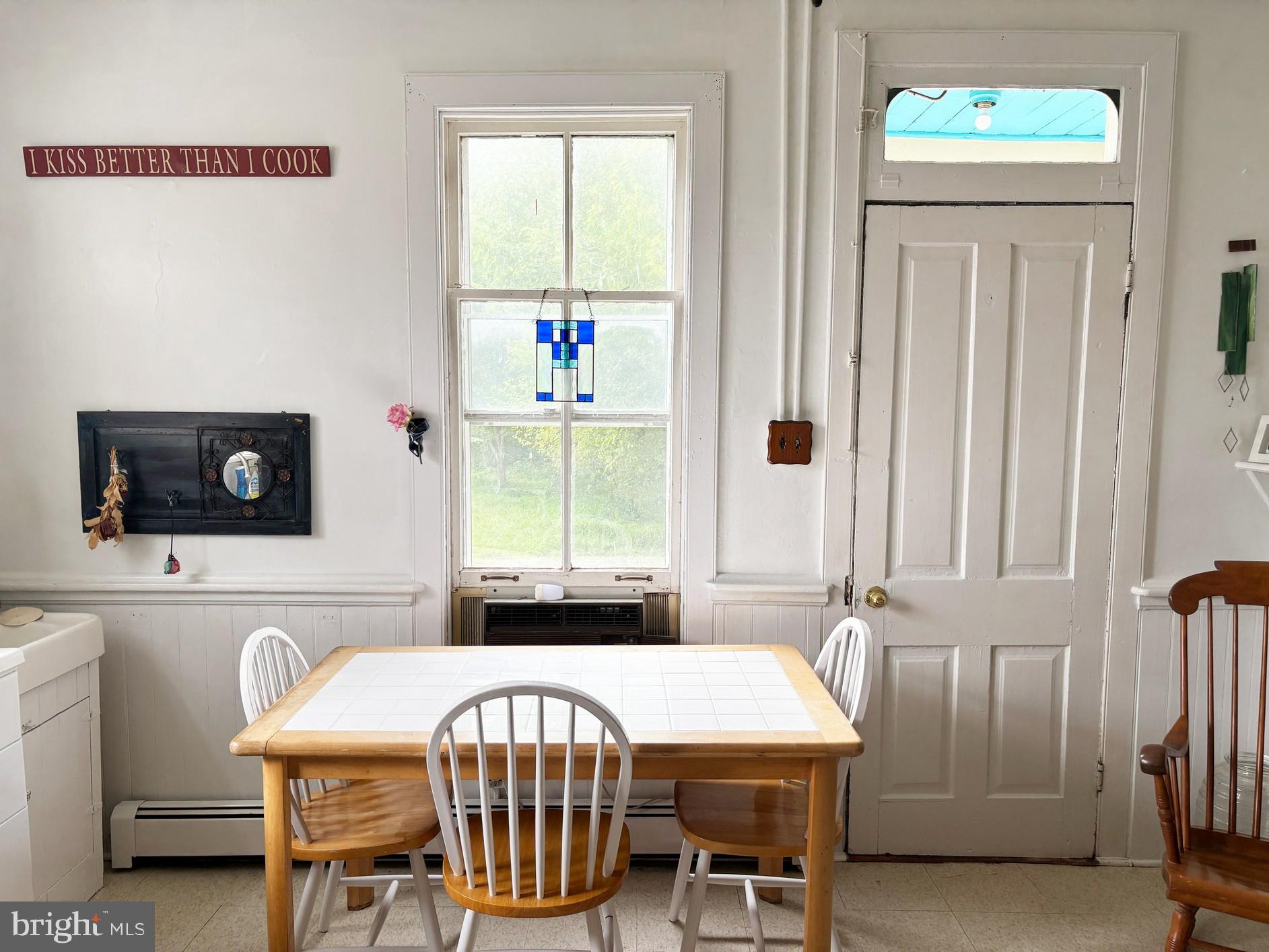 2209 Keysville Frederick Co Road Keymar, MD 21757 - Photo 15 of 150 a view of a dining room with furniture and a window
