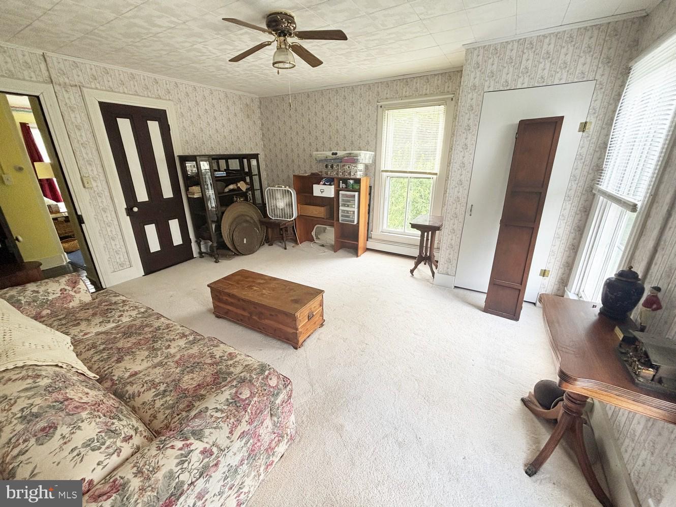 2209 Keysville Frederick Co Road Keymar, MD 21757 - Photo 28 of 150 a living room with furniture and a flat screen tv