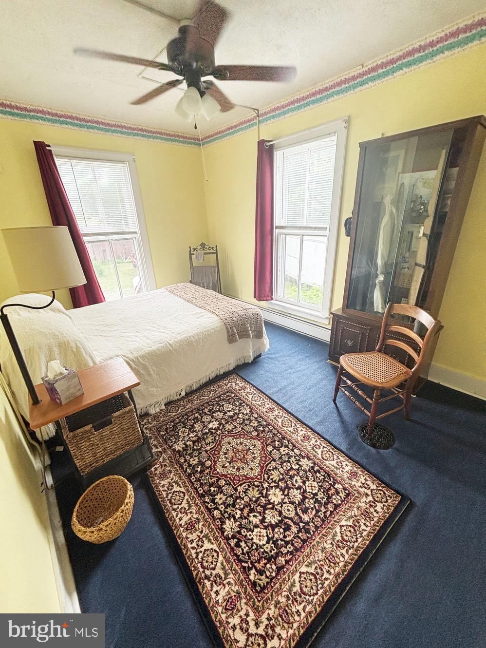 2209 Keysville Frederick Co Road Keymar, MD 21757 - Photo 46 of 150 a bed sitting in a bedroom next to a window