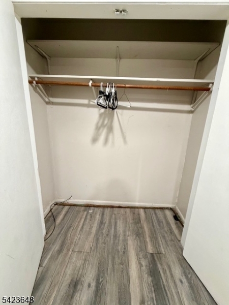 356 Pacific Street, Unit 3 Paterson, NJ 07503 - Photo 9 of 11 a view of a room with wooden floor