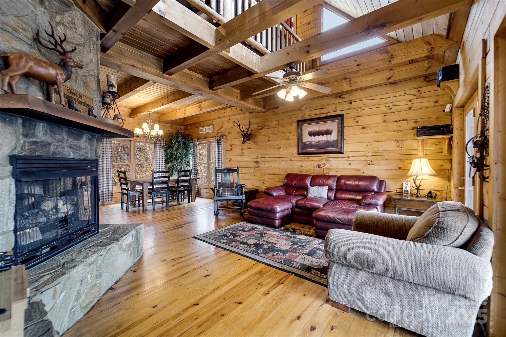 561 Signal Ridge Sylva, NC 28779 - Photo 11 of 48 a living room with furniture and a fireplace