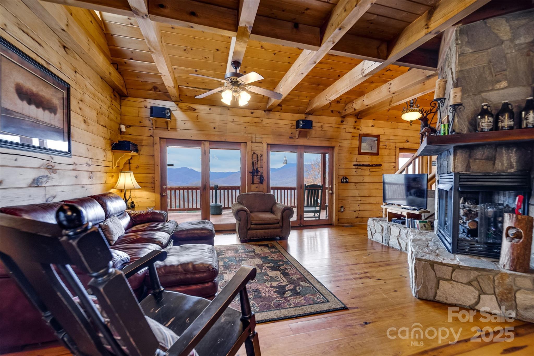 561 Signal Ridge Sylva, NC 28779 - Photo 13 of 48 a living room with furniture and a fireplace