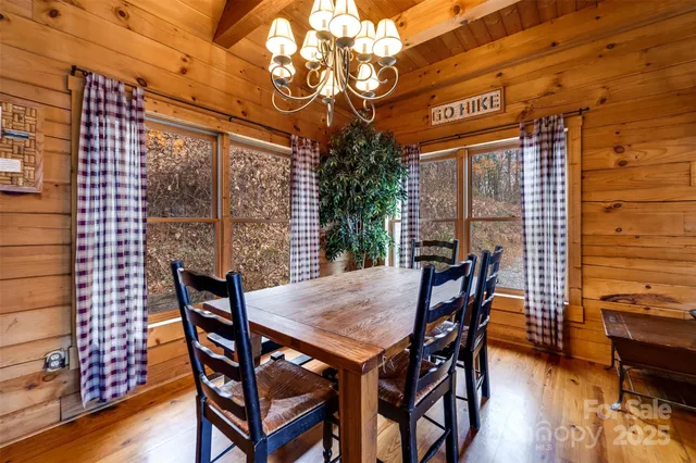 a view of a patio with a table and chairs