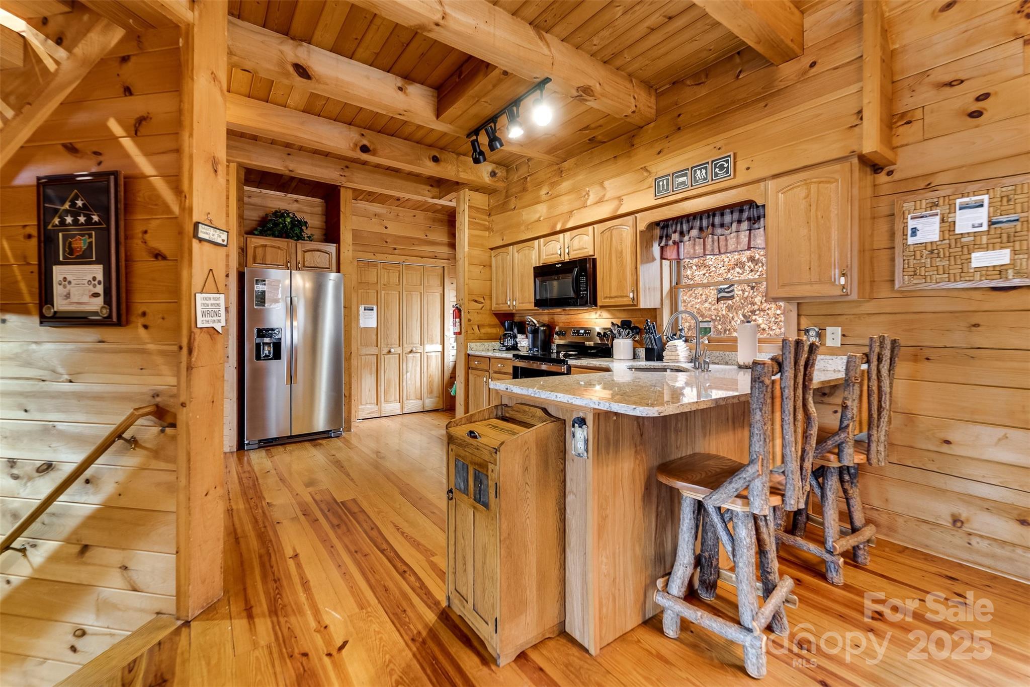 561 Signal Ridge Sylva, NC 28779 - Photo 16 of 48 a view of a kitchen with a sink and cabinets
