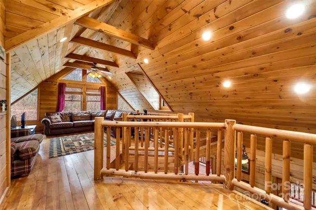 a view of a swimming pool with seating area