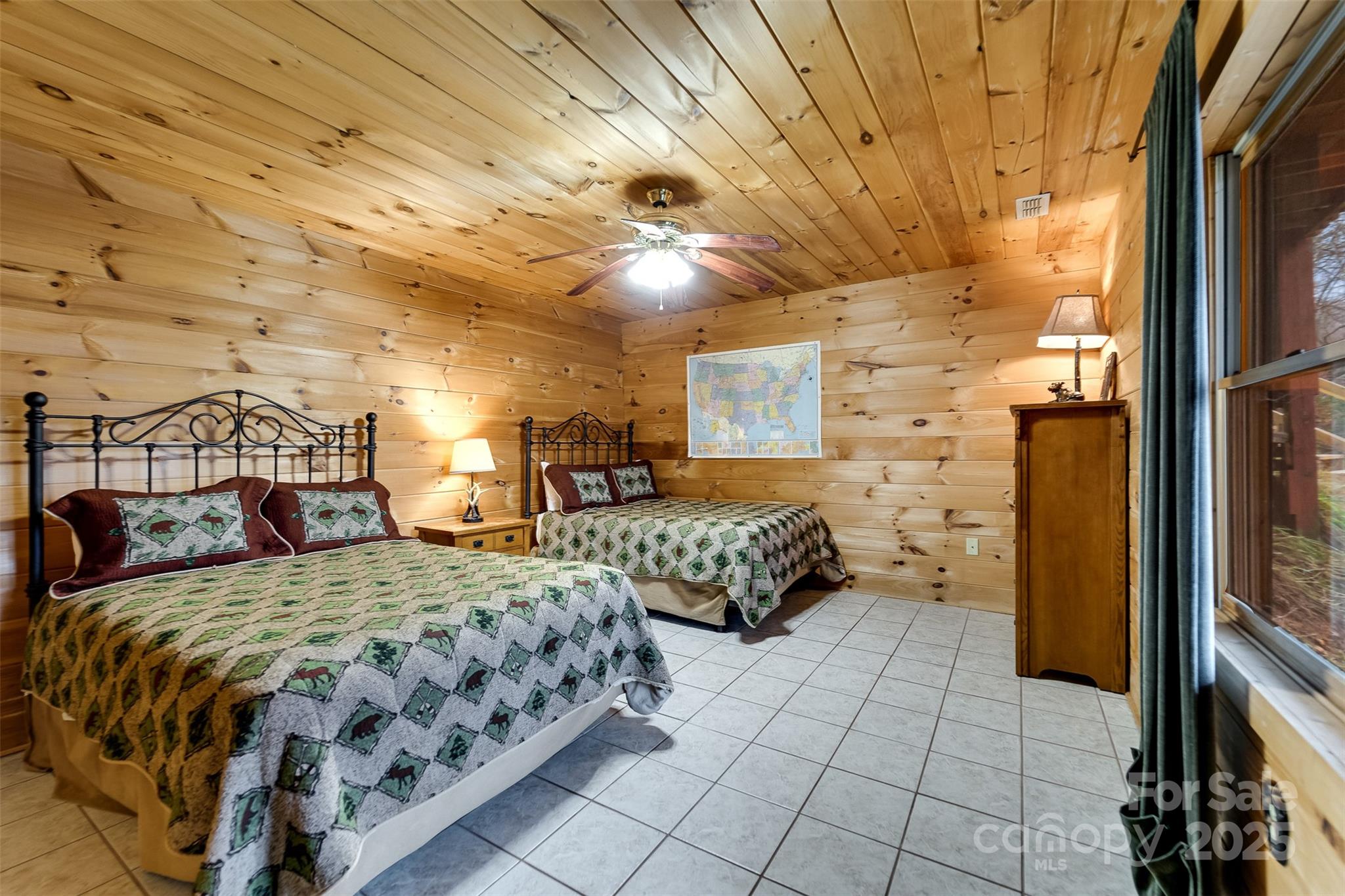 561 Signal Ridge Sylva, NC 28779 - Photo 34 of 48 a bedroom with double bed and a window