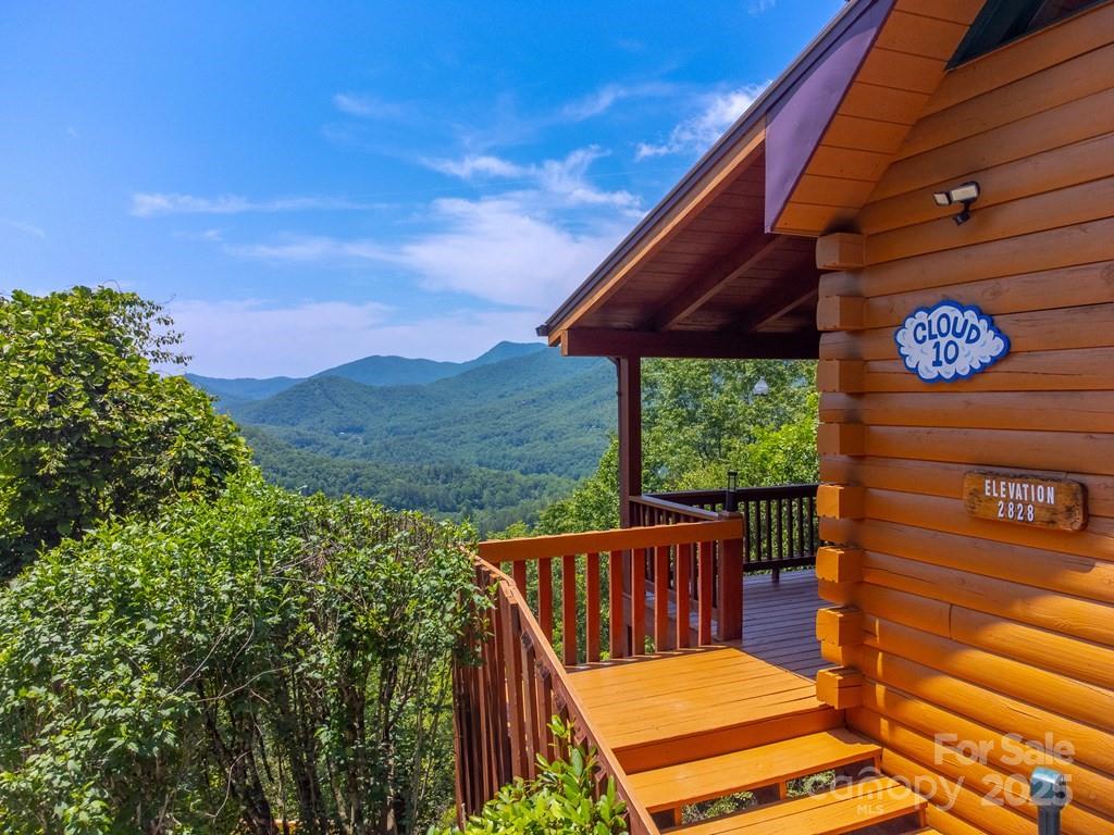 561 Signal Ridge Sylva, NC 28779 - Photo 5 of 48 a view of a two chairs in the roof deck